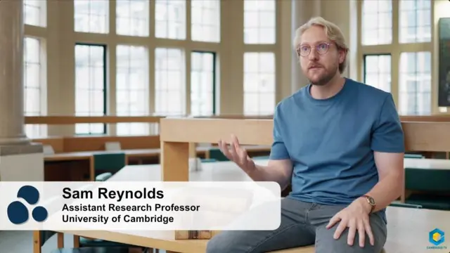 Sam Reynolds speaking to camera in the ai@cam film about the Conservation Evidence Copilot